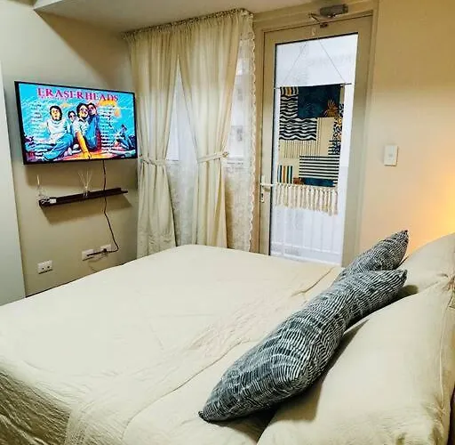 10g Cozy At Park Mckinley West Near Venice Mall Apartment Manila